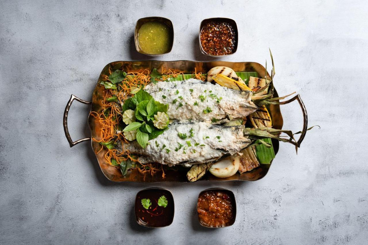 Отель The Ritz-Carlton, Куала-Лумпур Экстерьер фото A dish of Thai-style grilled grouper